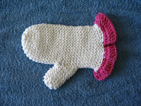 Mitt with simple crocheted ruffle.