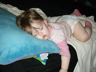 Sasha sleeping on body pillow