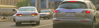 A driver suddenly realises he is in the wrong lane...