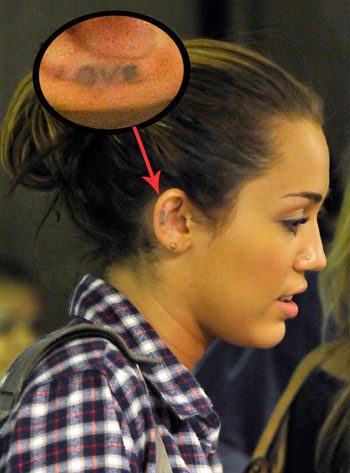 miley cyrus tattoo. Miley+cyrus+love+tattoo+on