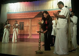 Luciana lights the lamp