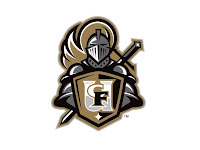 Silver knight mascot logo holding a gold, black, and white shield with the UCF logo.