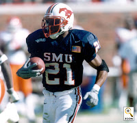 SMU running back carries the football.