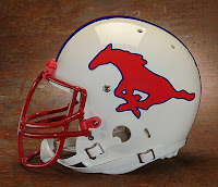SMU football helmet. White football helmet with red mustang painted on and red face mask.