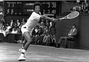 Arthur Ashe in action against reigning champion Jimmy Connors in the men's final on Centre Court at Wimbledon on July 6, 1975. Ashe won 6-1 ,6-1, 5-7, 6-4 to become the first African-American man to win Wimbledon. (AP Photo)