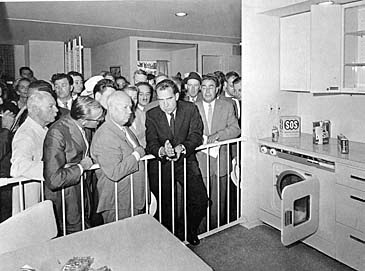 Vice President Richard Nixon and Soviet Premier Nikita Khrushchev, to Nixon's right, hold their 'kitchen debate' while touring the United States exhibit at Moscow's Sokolniki Park on July 24, 1959. (AP Photo)