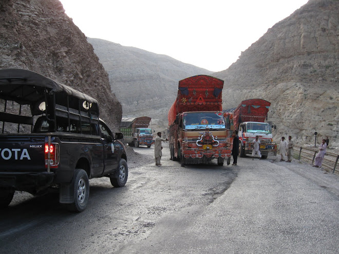 Trucks struggle on the gradient through the Bolan Pass