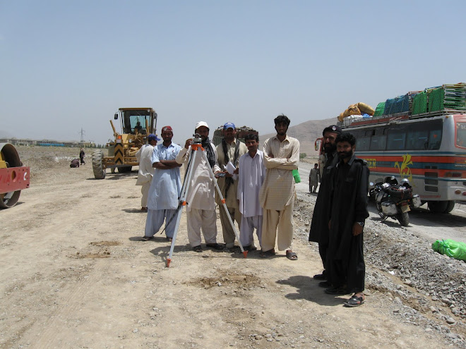 We talk to the road construction engineers while we wait for a change of guards.