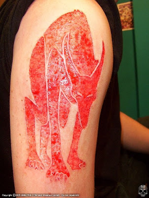 Skin Cutting Tattoos