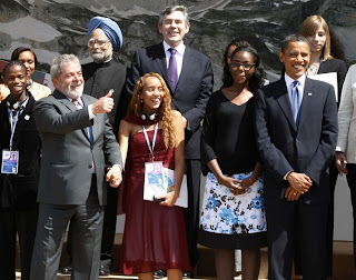 Brazilian President Luiz Inacio Lula da Silva poses with his junior G8 delegate Mayora Tavares as other leaders, including U.S. President Barack Obama gather for a group picture at the G8 Summit in L'Aquila July 9, 2009 Brazilian President Luiz Inacio Lula da Silva poses with his junior G8 delegate Mayora Tavares as other leaders, including U.S. President Barack Obama gather for a group picture at the G8 Summit in L'Aquila July 9, 2009