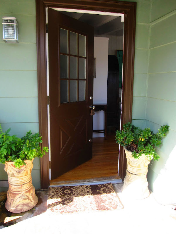 Exterior of a home in the Hollywood Hills with a chocolate brown door