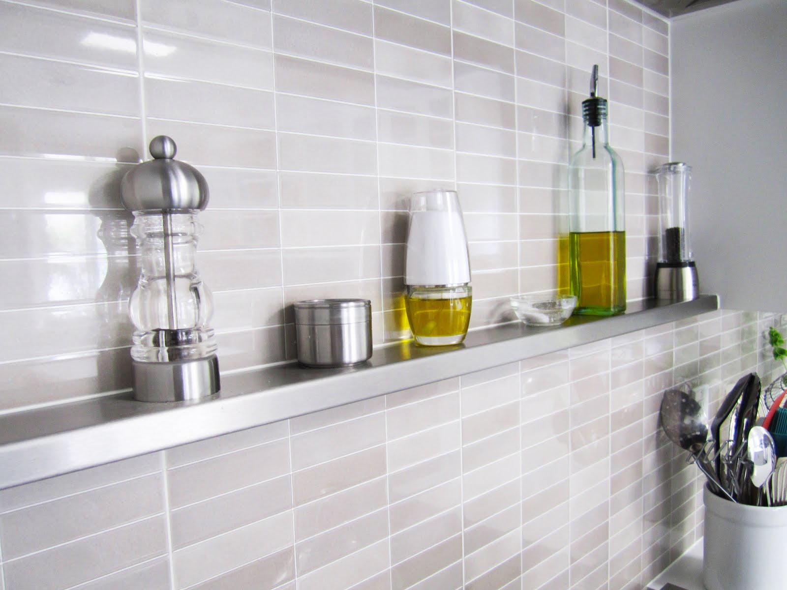 A tile backsplash behind the