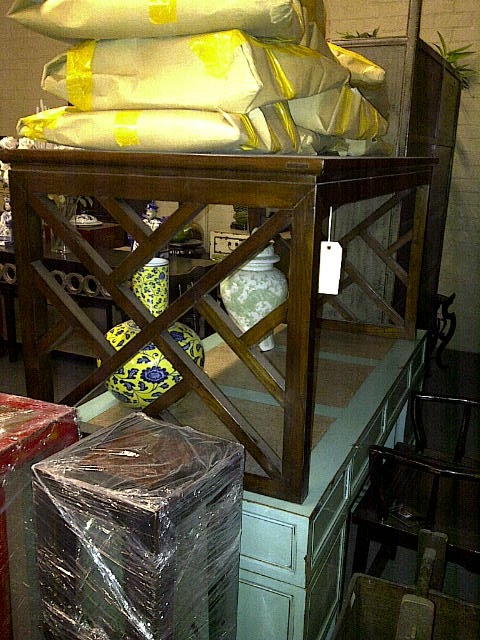 chocolate brown fretwork desk in a warehouse