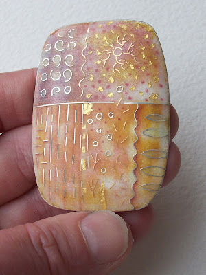 Here tiny specks of gold foil are fused into this cloisonne piece. Here tiny specks of gold foil are fused into this cloisonne piece.