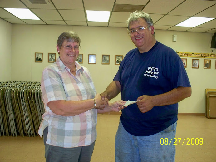 Mary Rhodes, treasurer & Tom Cannon