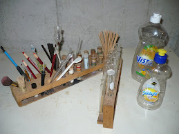 8) Wooden Racks and Plastic Water Bottles