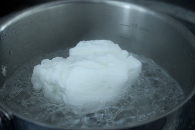 Making the meringues for the 'iles flottantes'