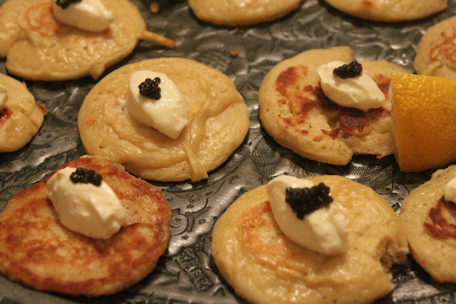  Home made blinis topped with Russian sour cream and real caviar 