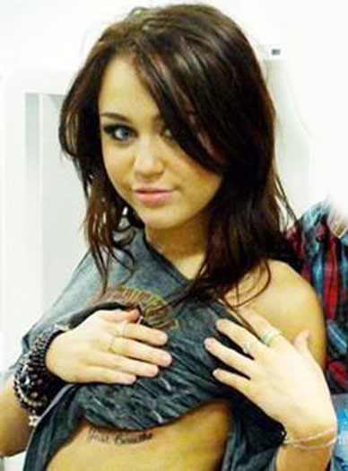 miley cyrus tattoos pictures. Miley+cyrus+tattoo