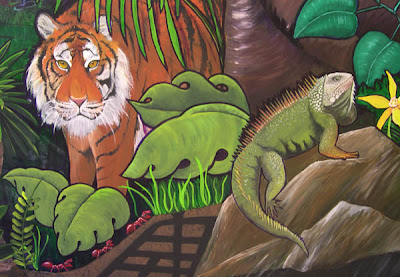 This is a detail view of the tiger and iguana in our jungle mural.