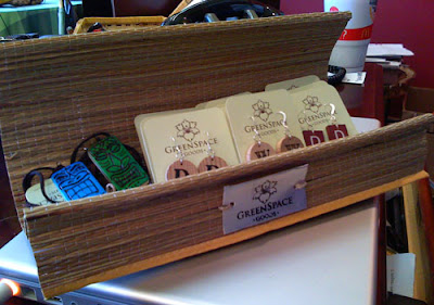 Point of purchase display holding tiki pendants and earrings