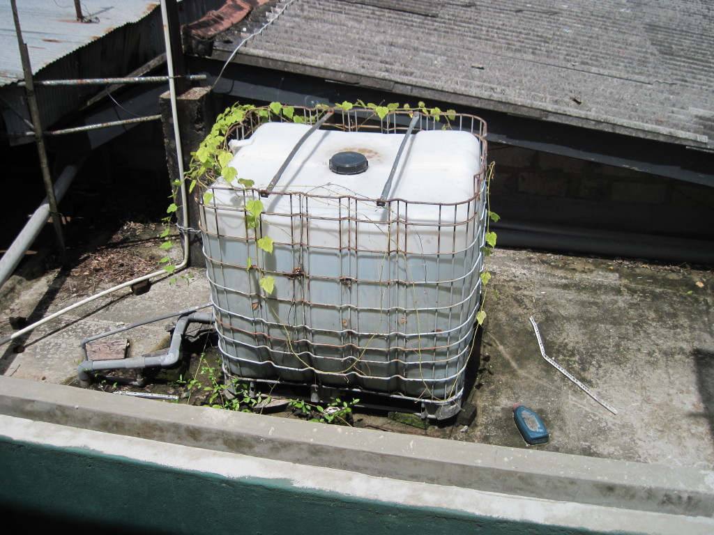 white monks at sri lanka water tank
