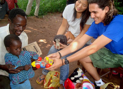 VOLUNTEER WORK IN AFRICA: Donating toys to orphanage
