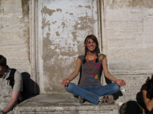 Carly loves yoga...enough to pose on the top of St. Peter"s Cathedral in the Vatican!