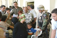 Salvadoran Soldiers from the Cuscatlán Battalion X rotation distributed 125 wheelchairs, food packets and school supply kits at the al-Rhama Disabled Association in al-Kut, April 18.