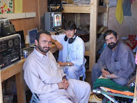 Sarwar and Islamuddin, the Bermel Radio station jockeys, located on Forward Operating Base Boris, Paktika province, broadcast religious services, play music, educational programs and spread news 13 hours a day to the local area.