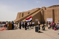 Iraqi citizens gather in front of the historical Ziggurat of Ur during a turnover ceremony at Contingency Operating Base Adder in southern Iraq, May 13. The site is now officially controlled and guarded by the Dhi Qar police and managed by the Ministry Of Tourism.