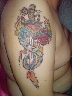 dragon and cross tattoos