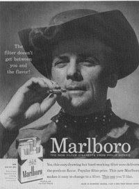 The Marlboro Man in an old advertisement. Image taken from http://motherpie.typepad.com/motherpie/2006/08/marlboro_going_.html