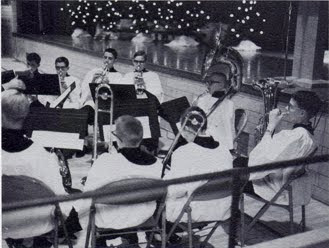 Brass band playing during Christmas Eve program of St John Church in Seward, Nebraska, in about 1966. The image was scanned from the 1966 school yearbook.