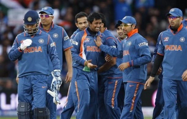 [India's+Pragyan+Ojha,+center+left,+celebrates+with+teammates+after+taking+the+wicket+of+Bangladesh's+Shakib+Al+Hasan.jpg]