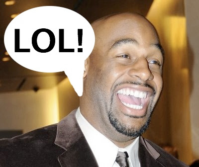 PHI+Donovan+McNabb+smiling+big+in+dress+suit.jpg