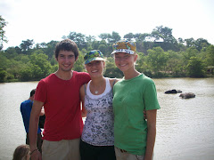 Eric, Me, and Amy in front of the watering hole, in front of elephants