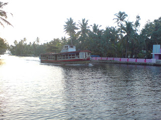 Transport Boat Service through Kuttanad backwaters at Kainakary