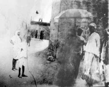 standing sai baba