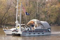 A l'ooping boat traveling rafted to another.  You thought you'd seen it all, when....'