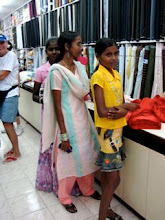 girls in fabric store
