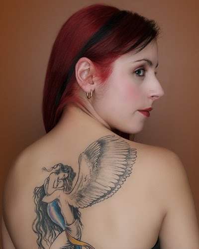 [Angel+tattoo+design+on+the+back+of+two+girls+body.jpg]