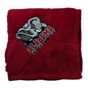 Red Bama blanket with gray elephant logo embroidered on the fleece throw.