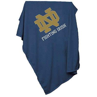 ND Fighting Irish sweatshirt blanket that is blue.