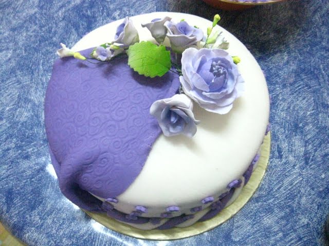 2 tiers White Purple fondant cakes ordered by Mr Kamaruzaman for his 