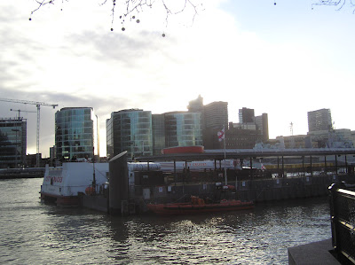 Cruise ship moored to a jetty on the Thames