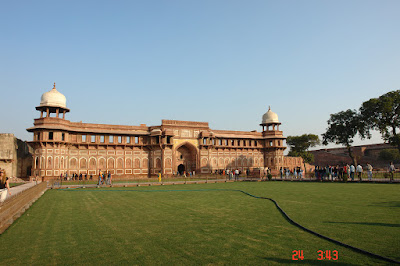The front of the Agra Fort and its greenery