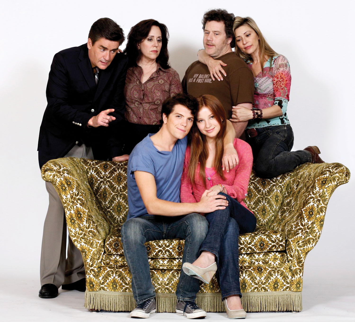 Behind the couch from left to right: Peter Keleghan, Ellen David, Alain Goulem and Angela Asher. On the couch from left to right: Michael Seater and Stacey Farber.