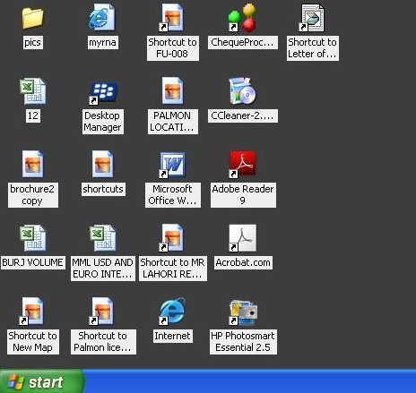 computer with too many icons littered over the desktop at some point