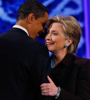 CaptionChallenge-BarackObama-HillaryClinton-embrace.jpg